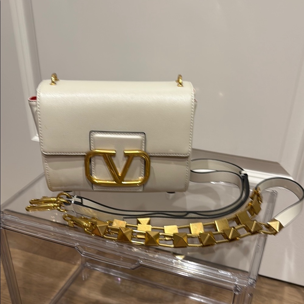 White and Gold Crossbody Bag with Iconic V Emblem